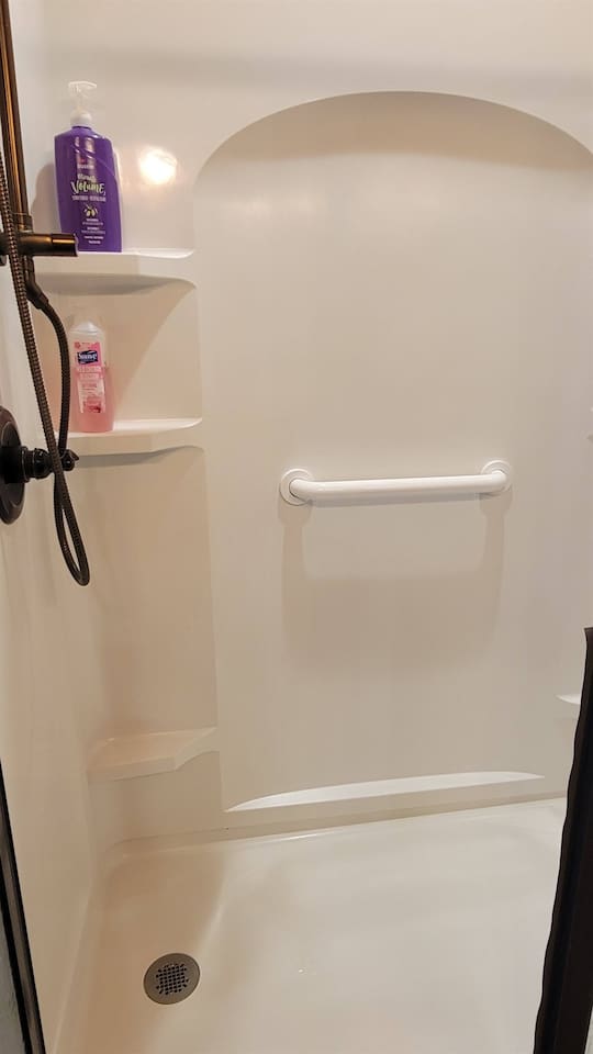 main floor shower with grab bar