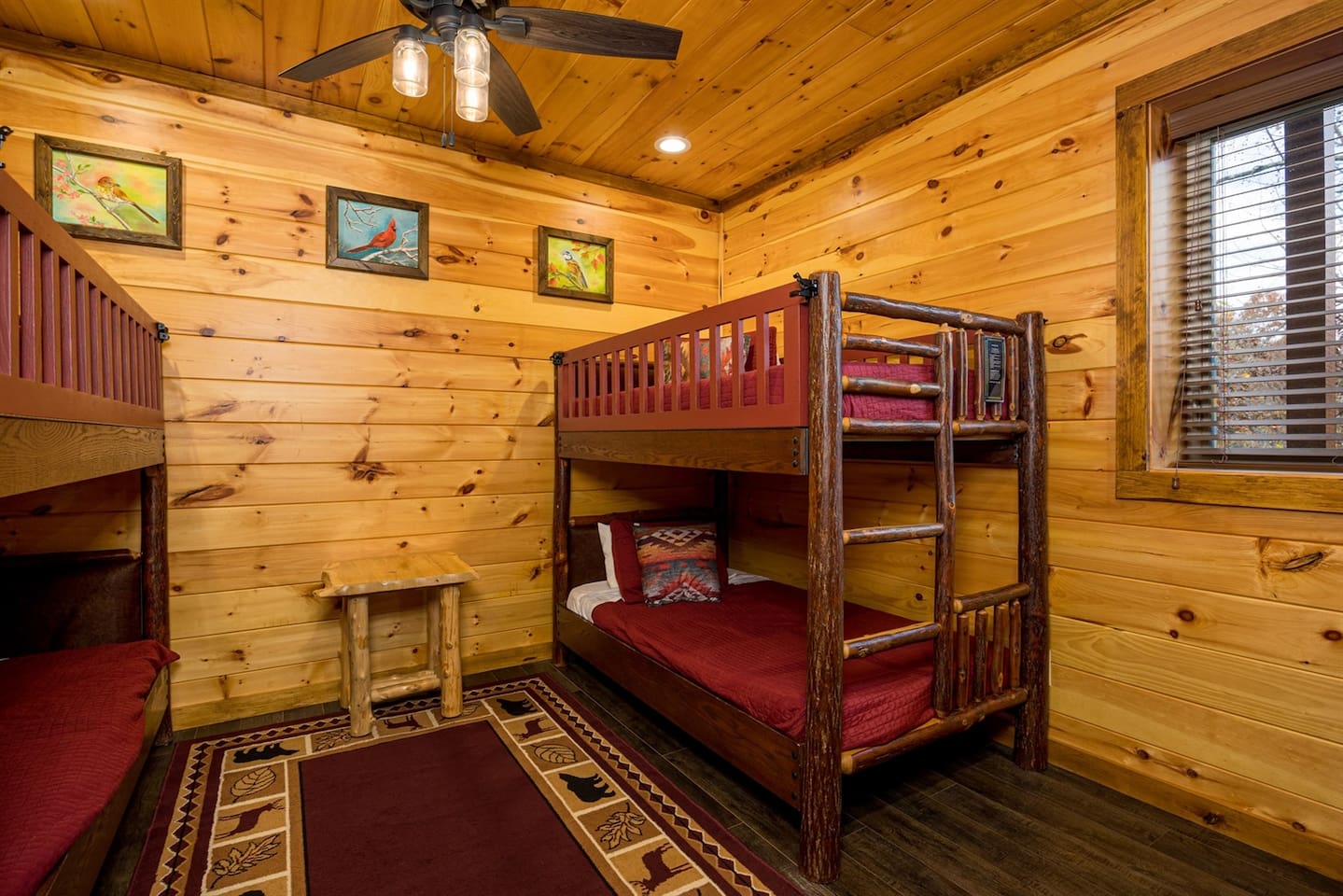 Lower level: bunk bedroom sleeps up to 4 kids 12 and under. Tree trunk beds