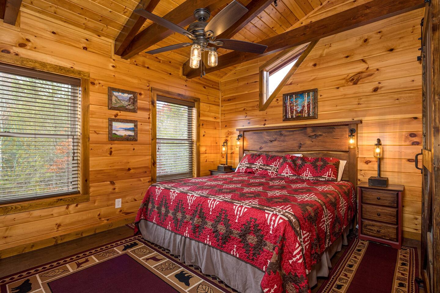 Upper level: king bedroom - live edge headboard & Ole Smoky moonshine jar lights