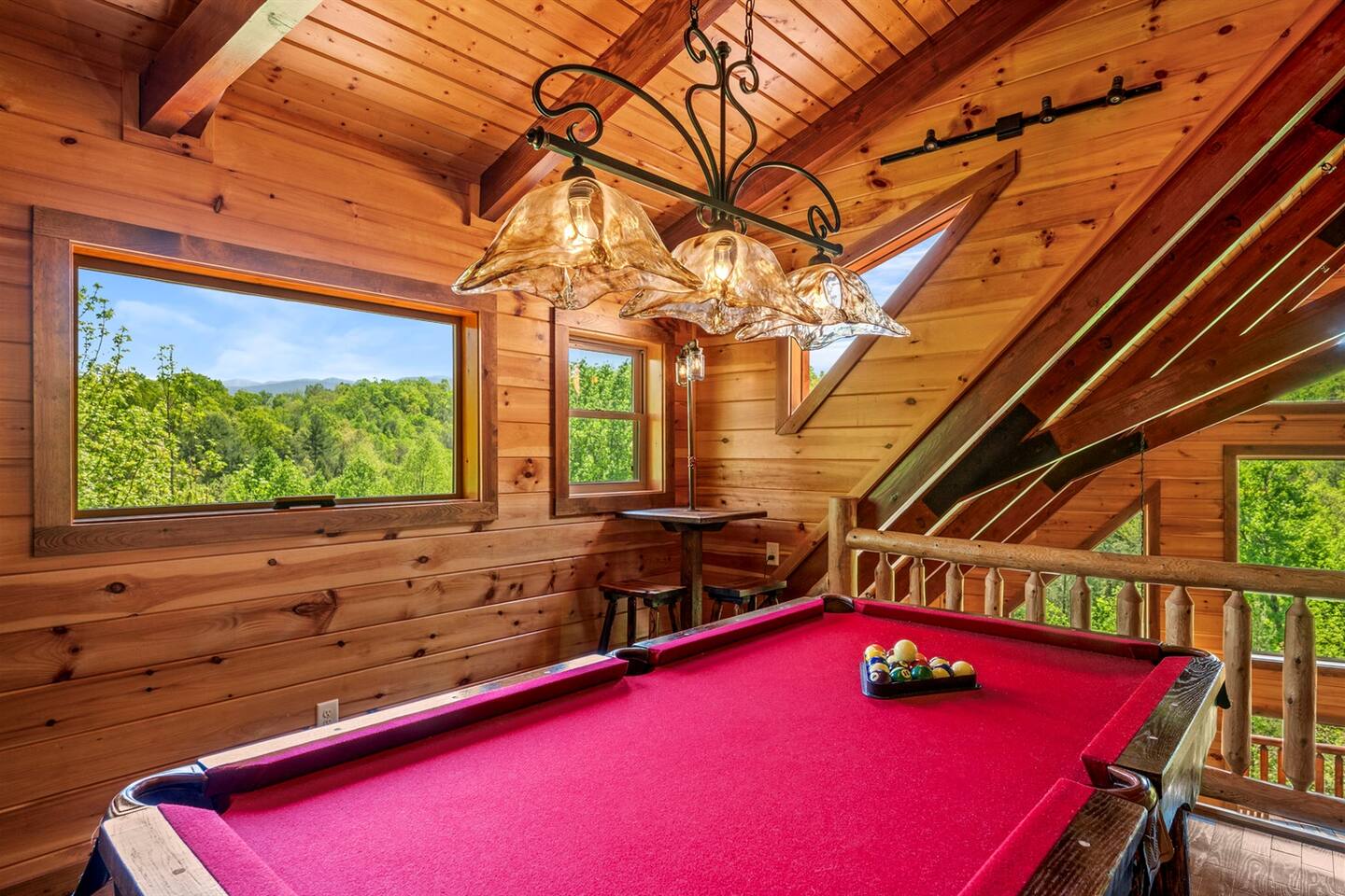 One of a kind local craftsman-made  7' pool table; loft with picture window and a view