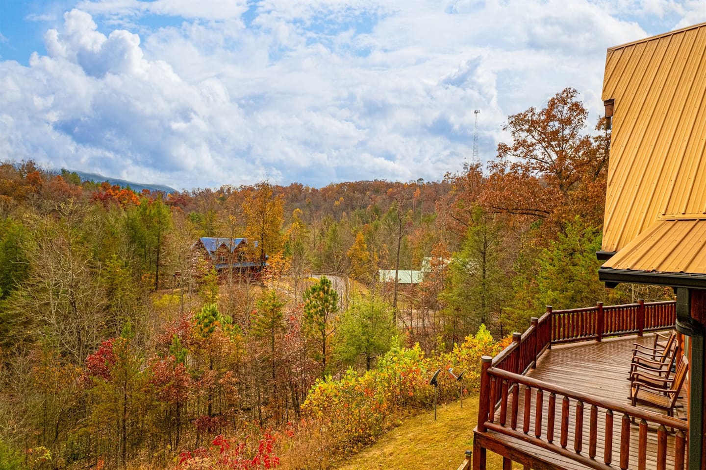 Front deck overlooking woods and mountains